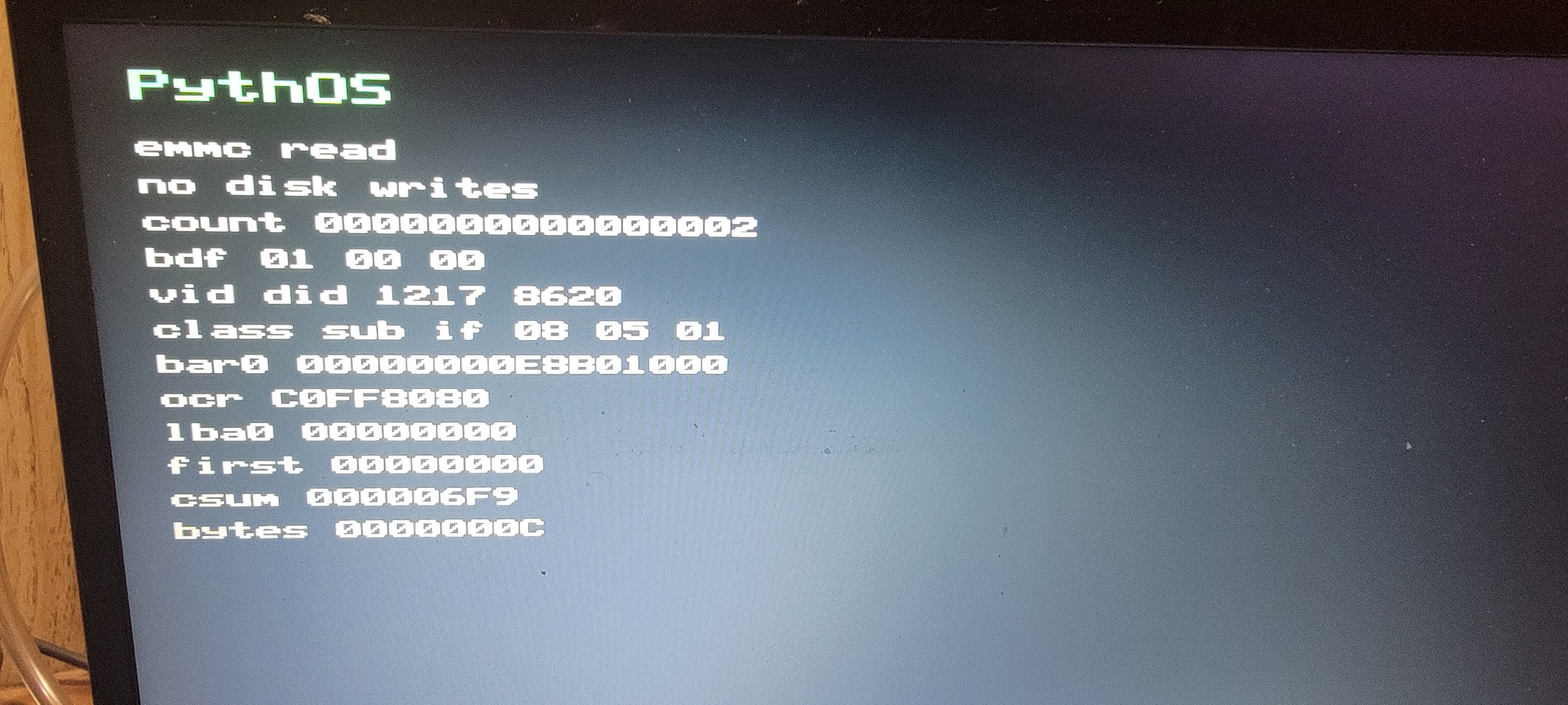 PythOS no-write hardware probe showing O2 Micro 1217:8620 SDHCI eMMC read evidence