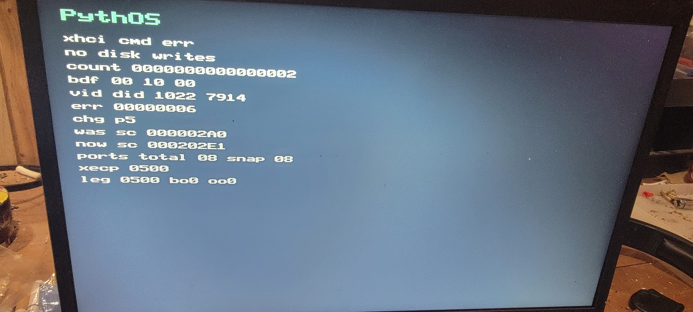 PythOS USB xHCI command probe showing error 00000006 after port 5 mouse connect on physical hardware